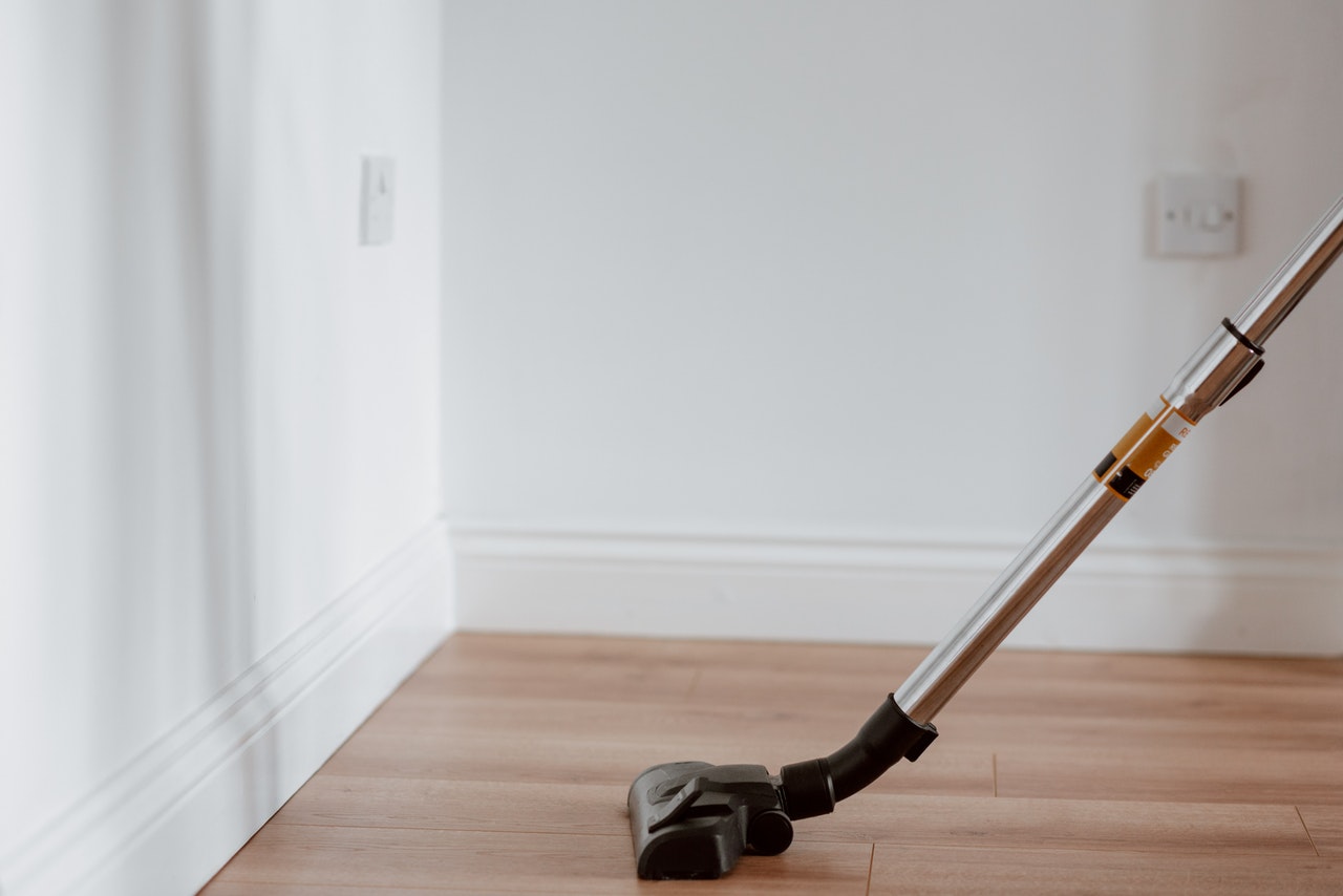 person cleaning the floor