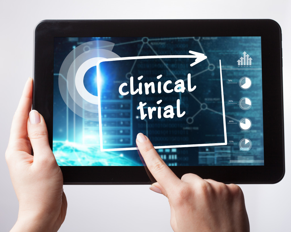 tablet displaying a clinical trial on the screen