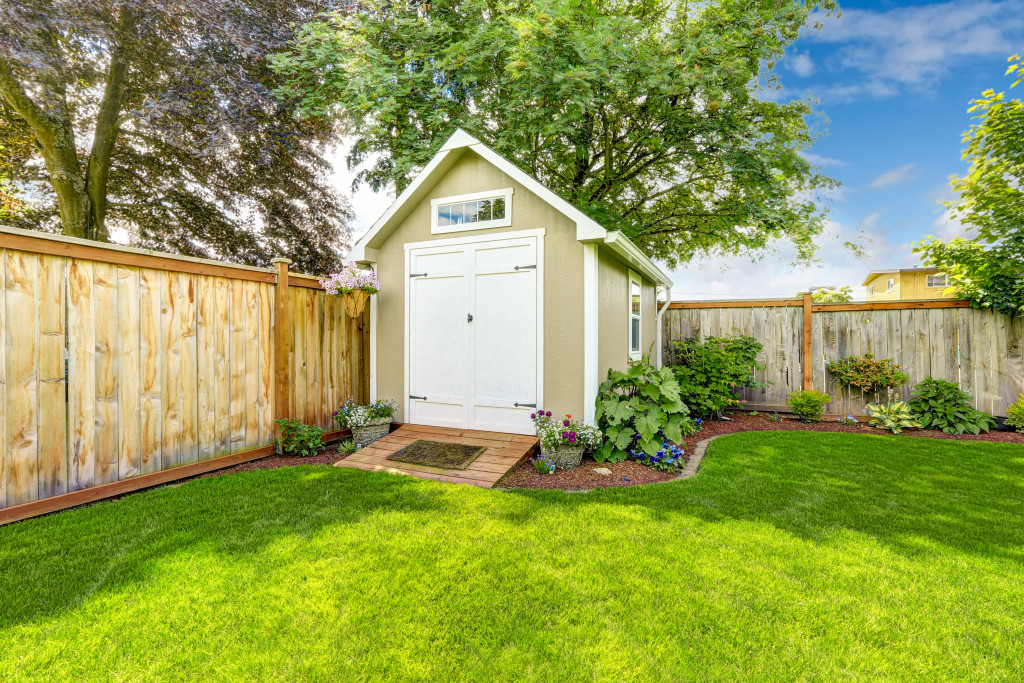  shed with flower bed on backyard