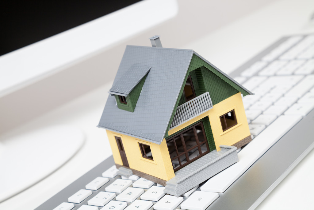 miniature house on a keyboard
