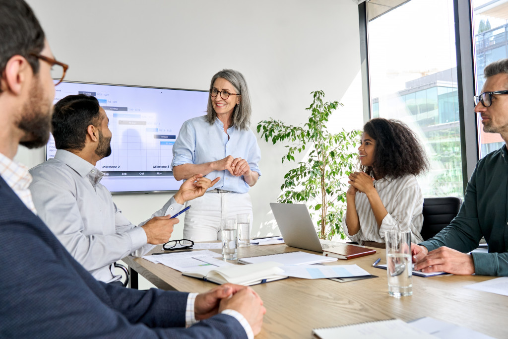 employees in the conference room for meeting