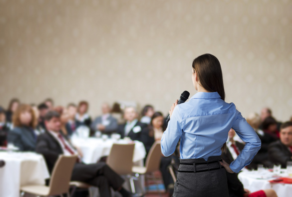 woman presenting in seminar