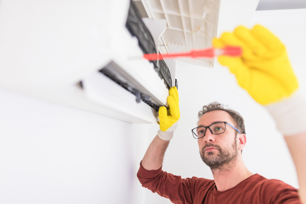 fixing AC unit and cleaning the filters.