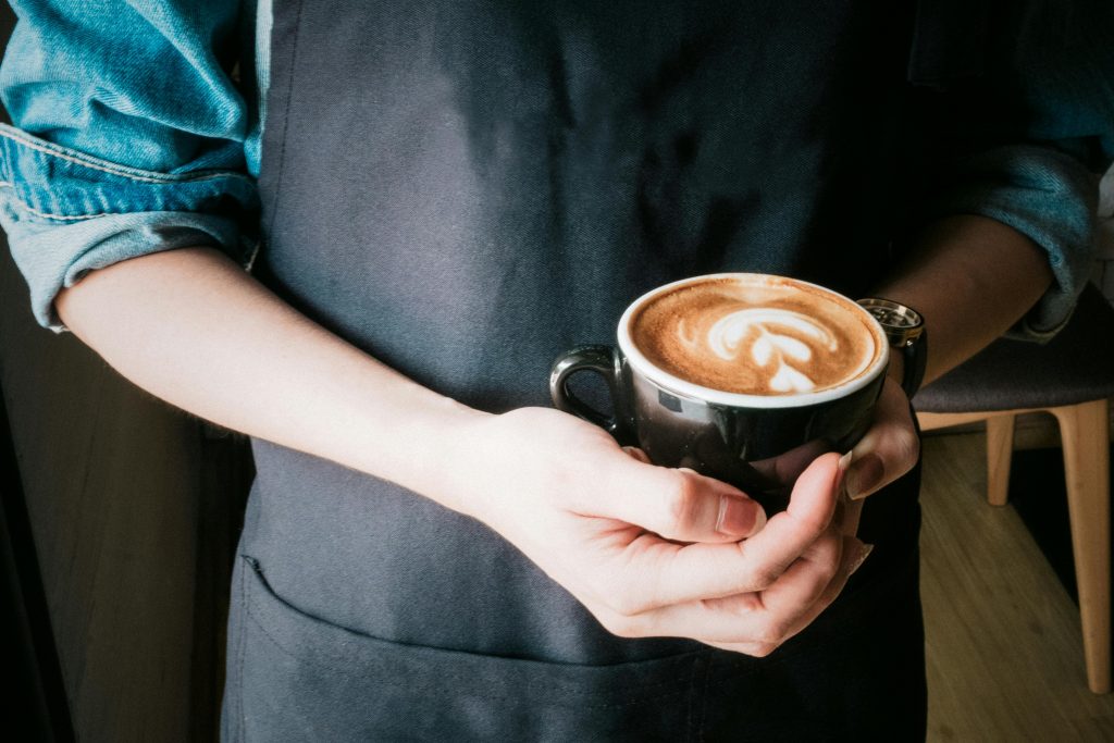 Woman holding a mug of coffee